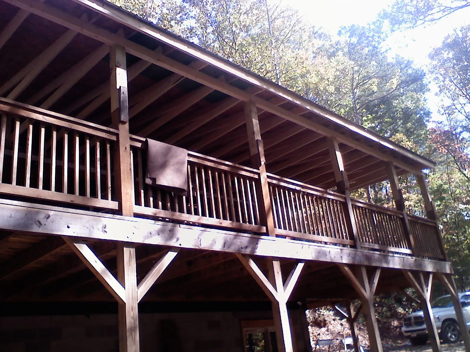 Timber framing under a new elevated porch and deck — Roof Leak Repair in Markham by Roofing Brothers